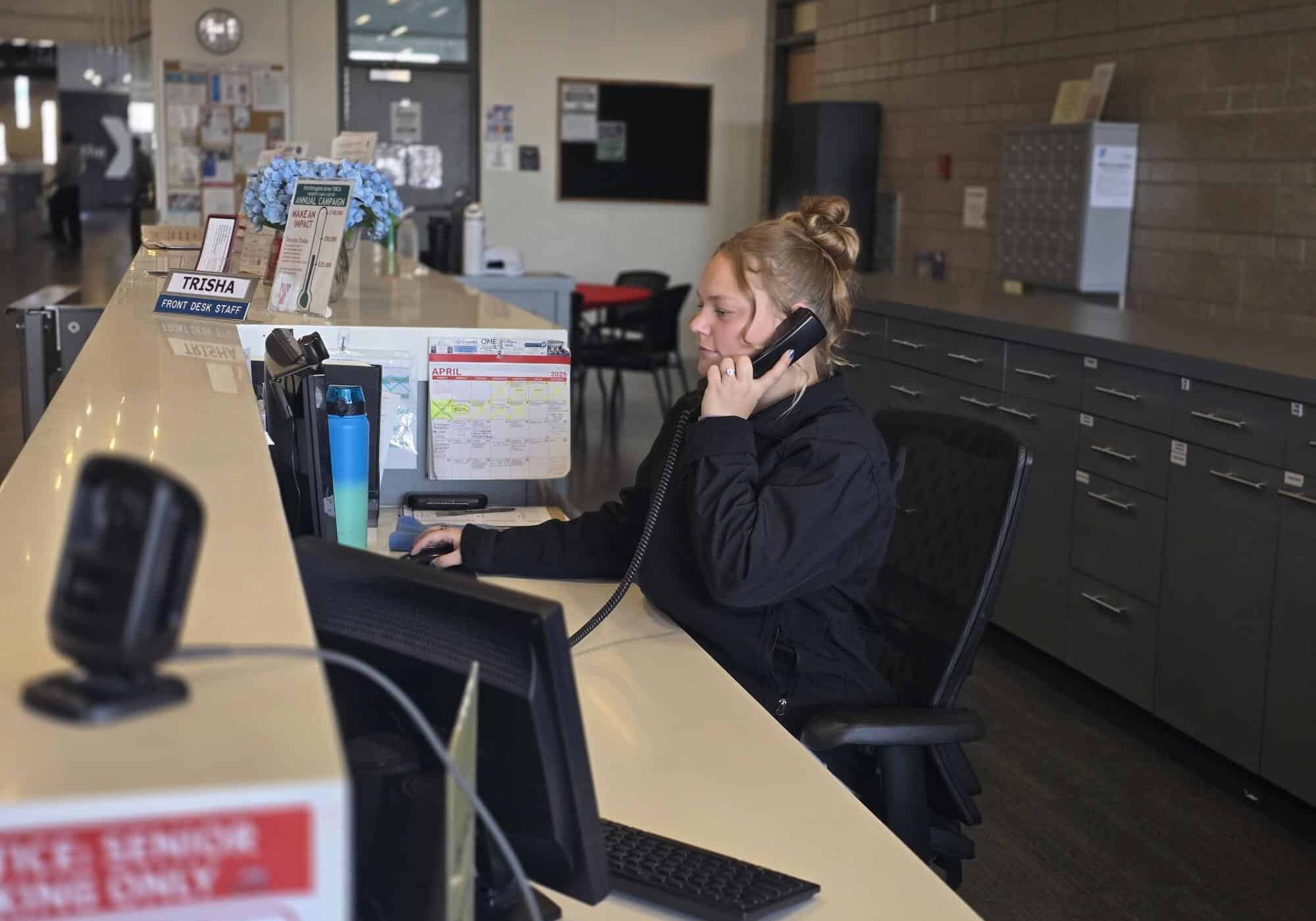 woman working at a reception desk in worthington, mn